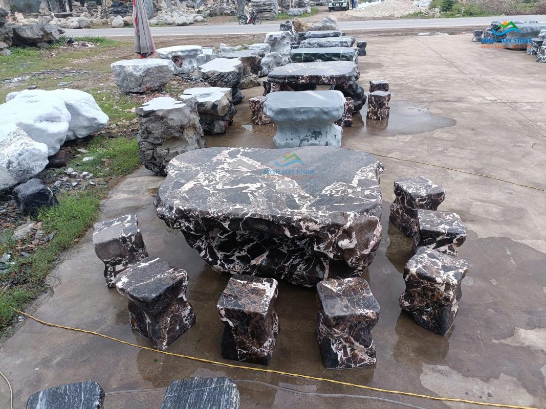 bàn ghế đá da báo đỏ